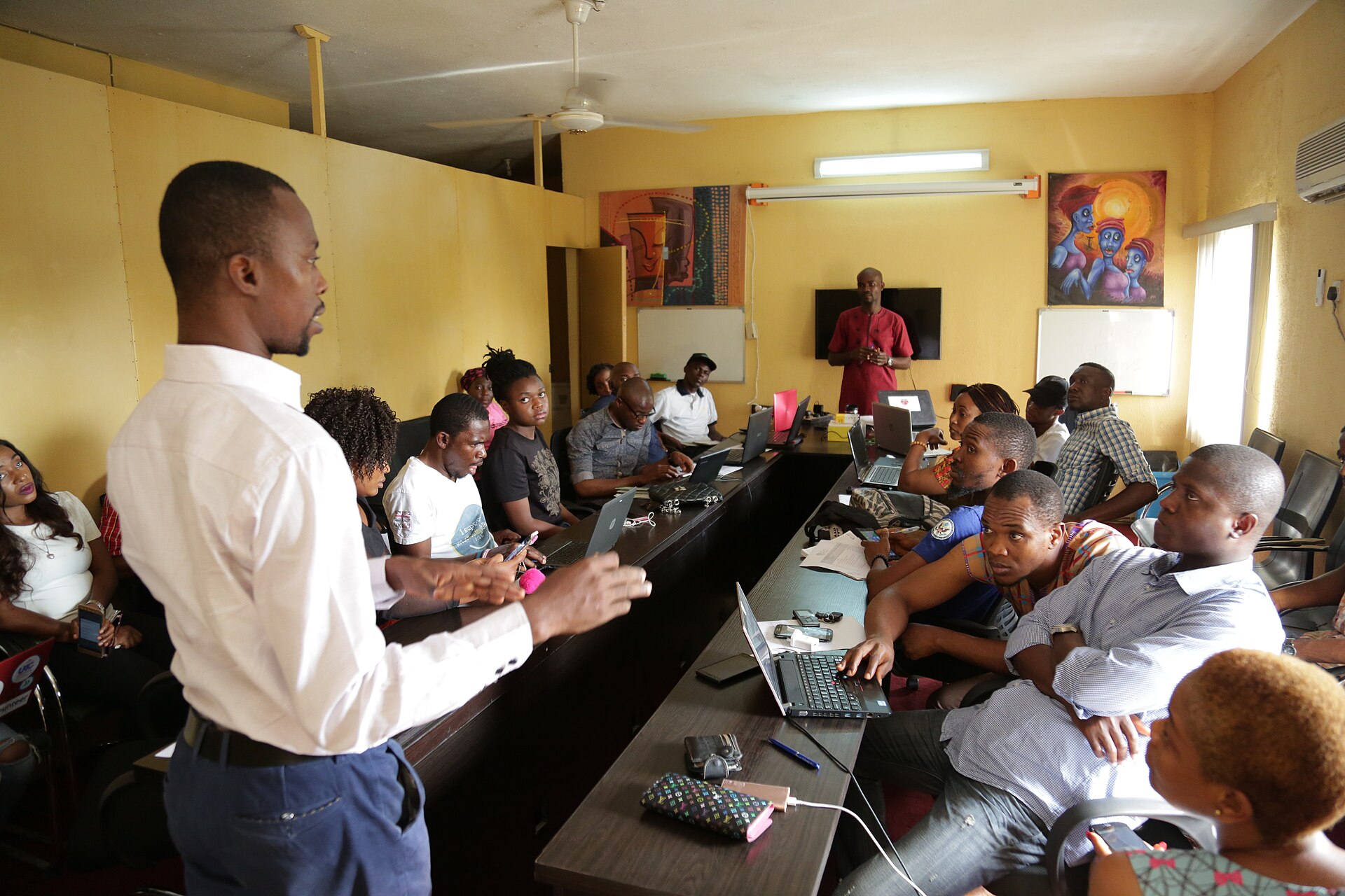 Facilitator leading a capacity-building session in Abuja